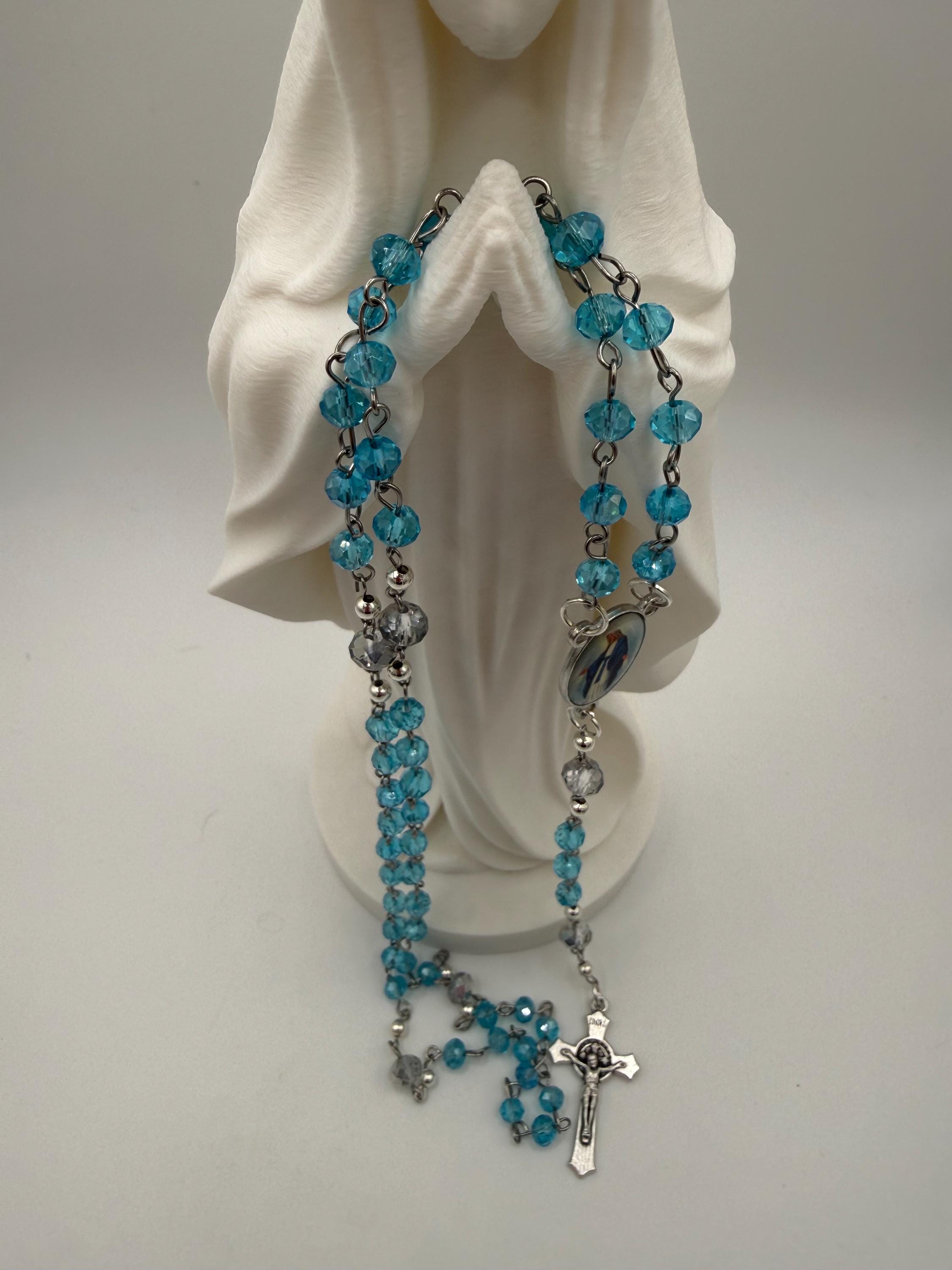 Light Blue Crystal Rosary with Mother Mary Centerpiece.