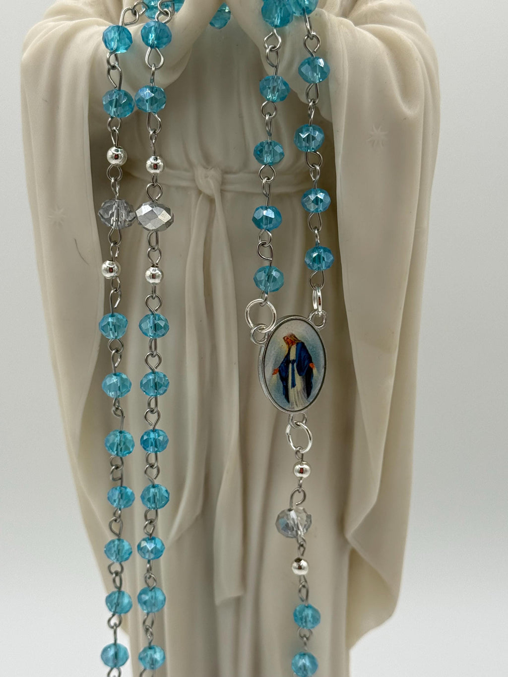 Light Blue Crystal Rosary with Mother Mary Centerpiece.