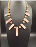 Rose quartz bib necklace with rectangular stone slabs and natural wood beads on cord