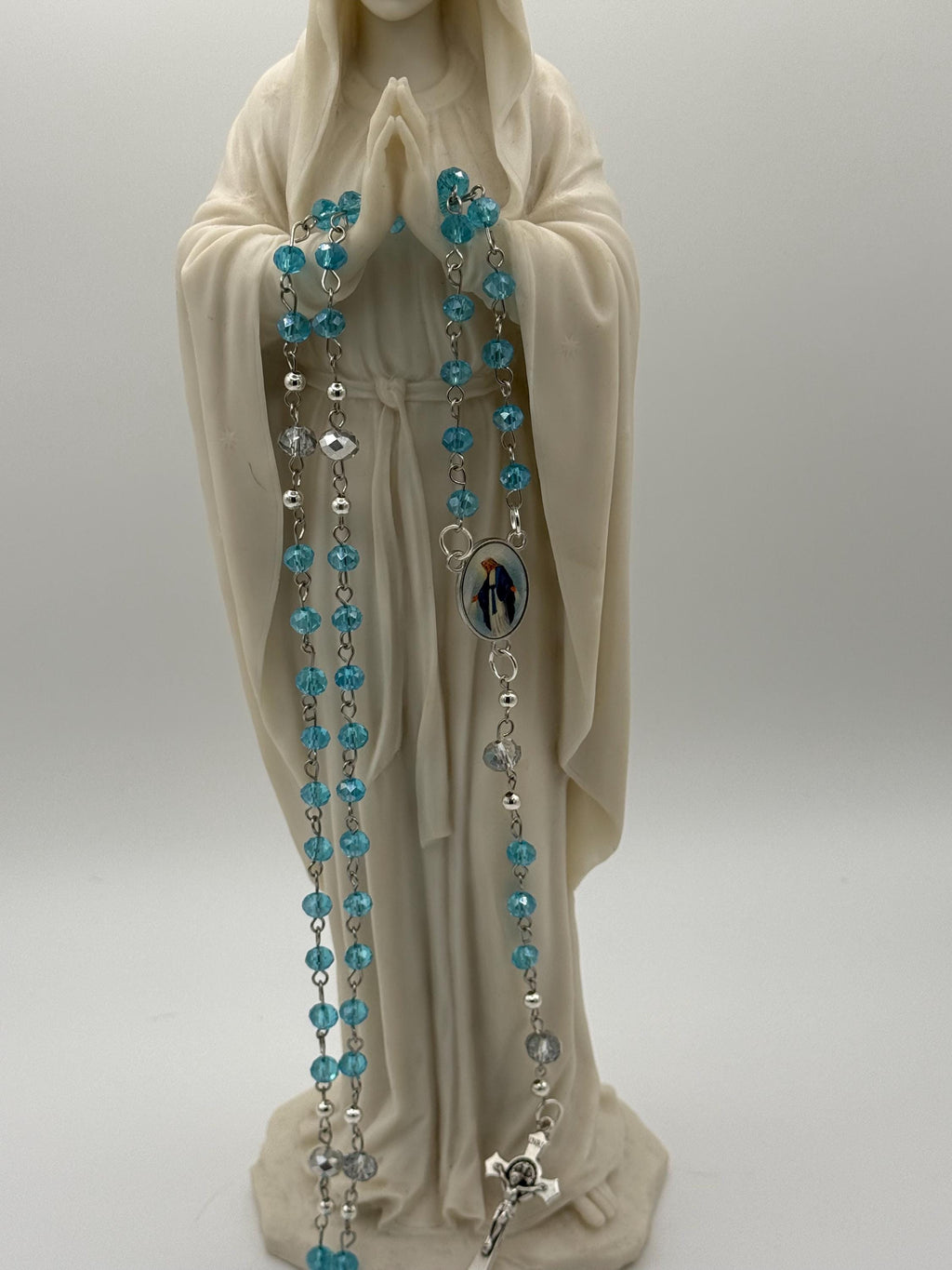 Light Blue Crystal Rosary with Mother Mary Centerpiece.