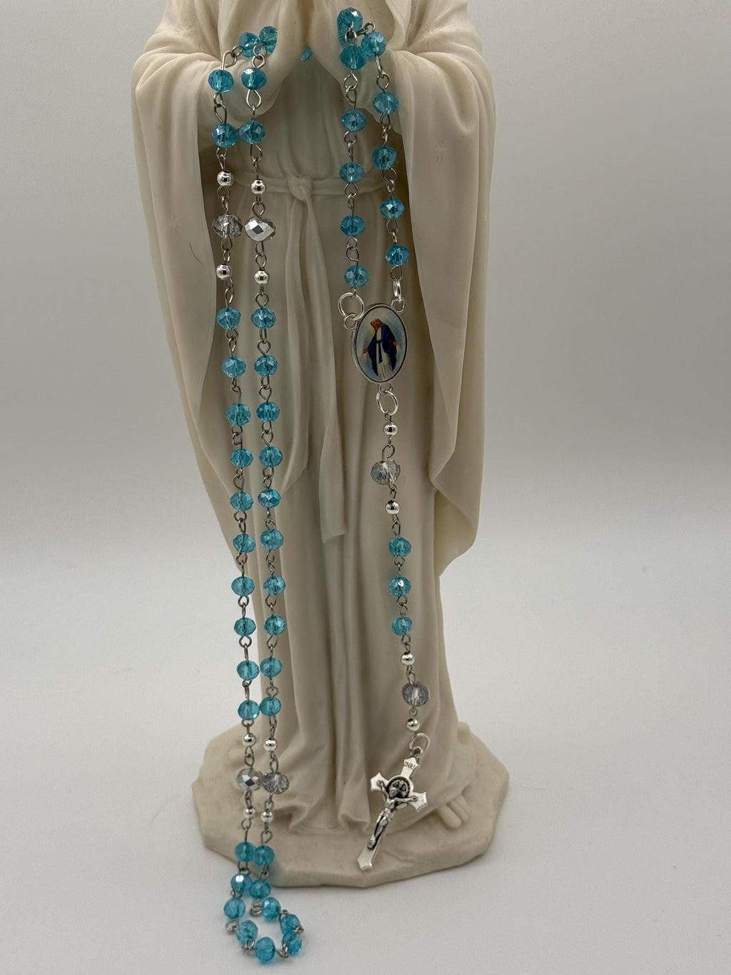 Light Blue Crystal Rosary with Mother Mary Centerpiece.