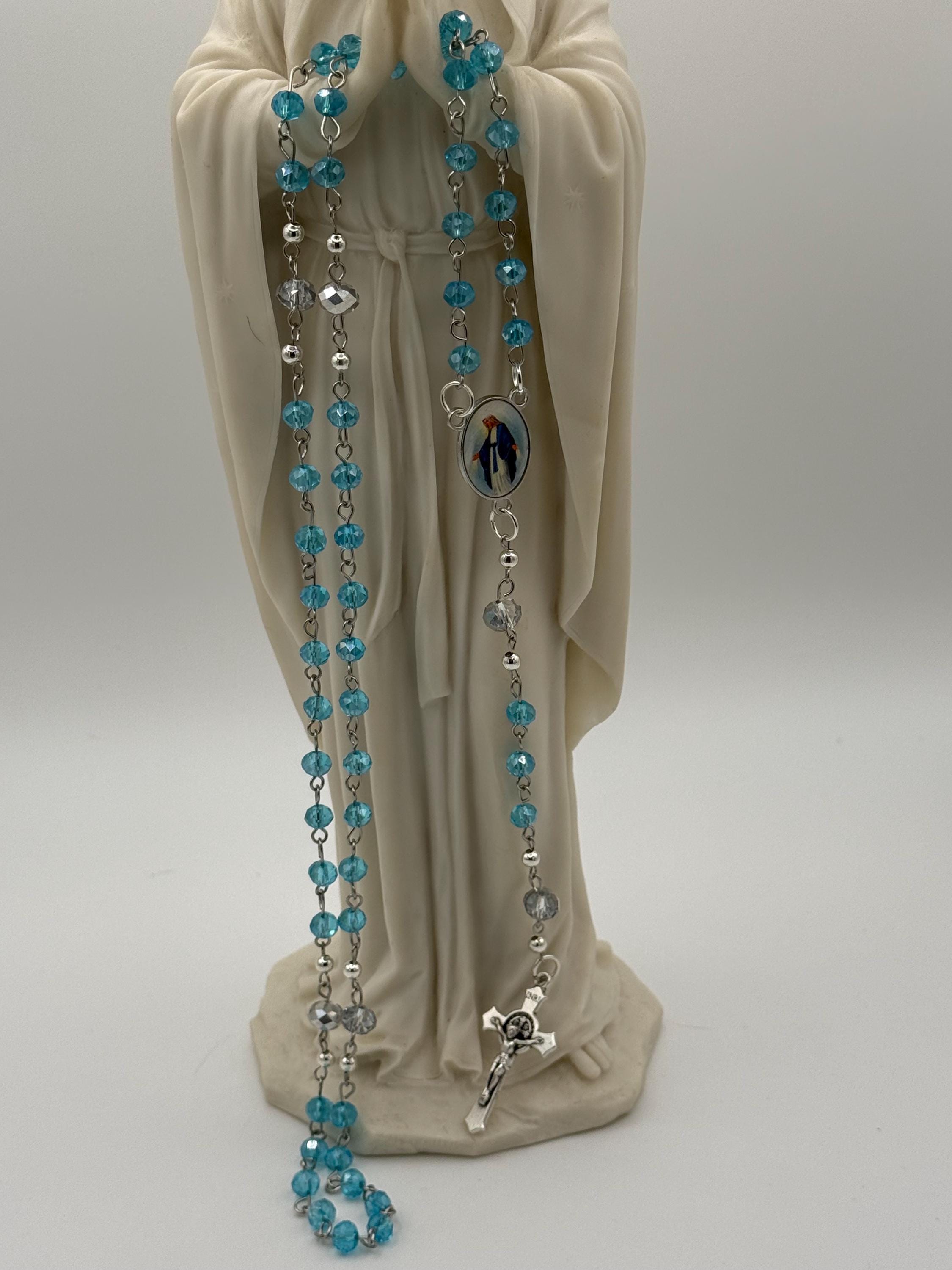 Light Blue Crystal Rosary with Mother Mary Centerpiece.