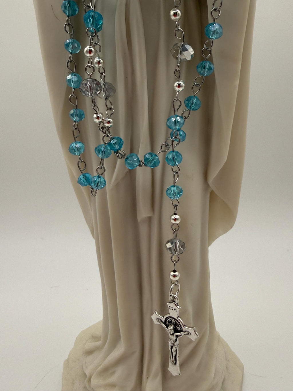 Light Blue Crystal Rosary with Mother Mary Centerpiece.